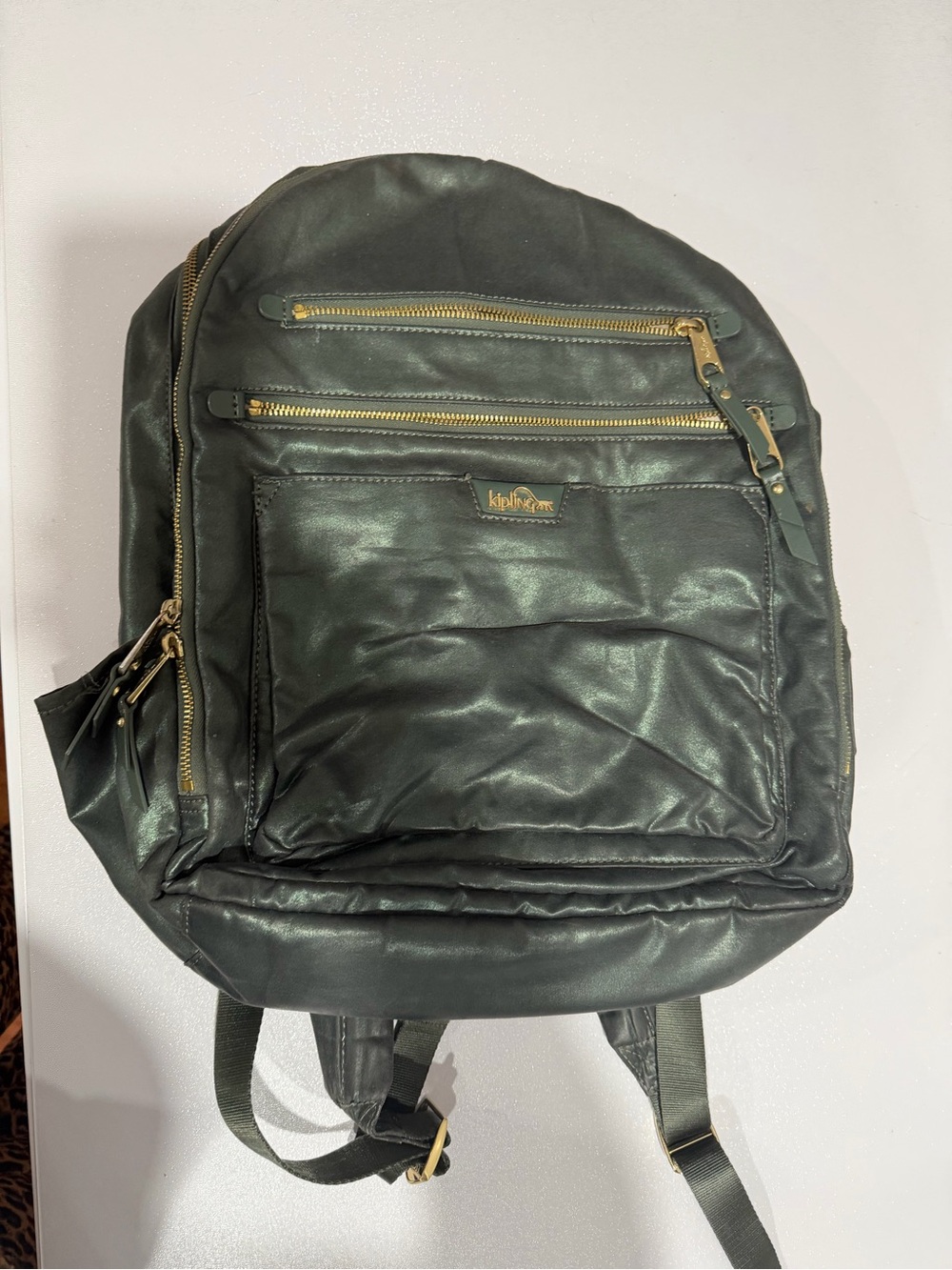 Kipling Metallic Dark Green Backpack with Gold Hardware